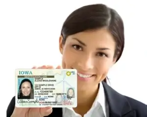Woman displays her driver's license