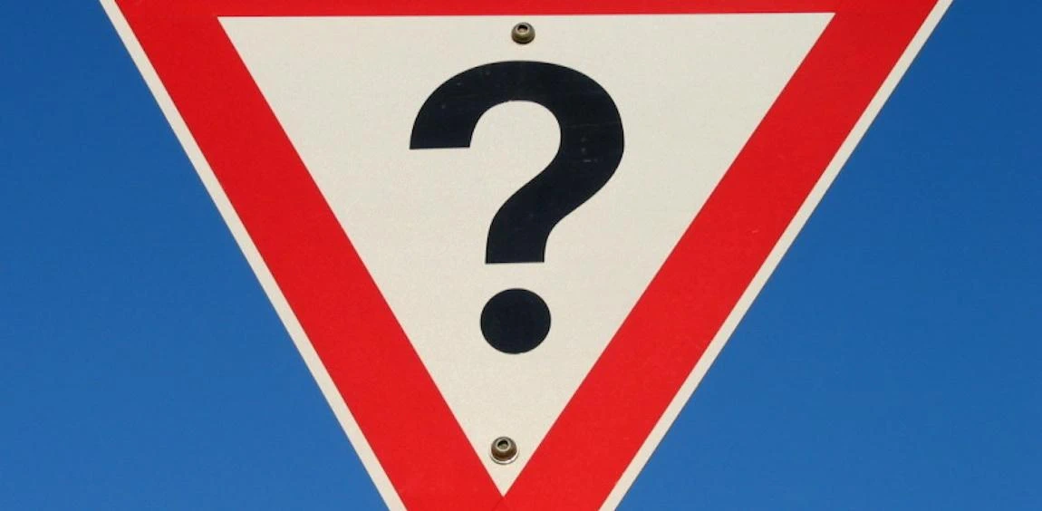 Question mark yield road type sign